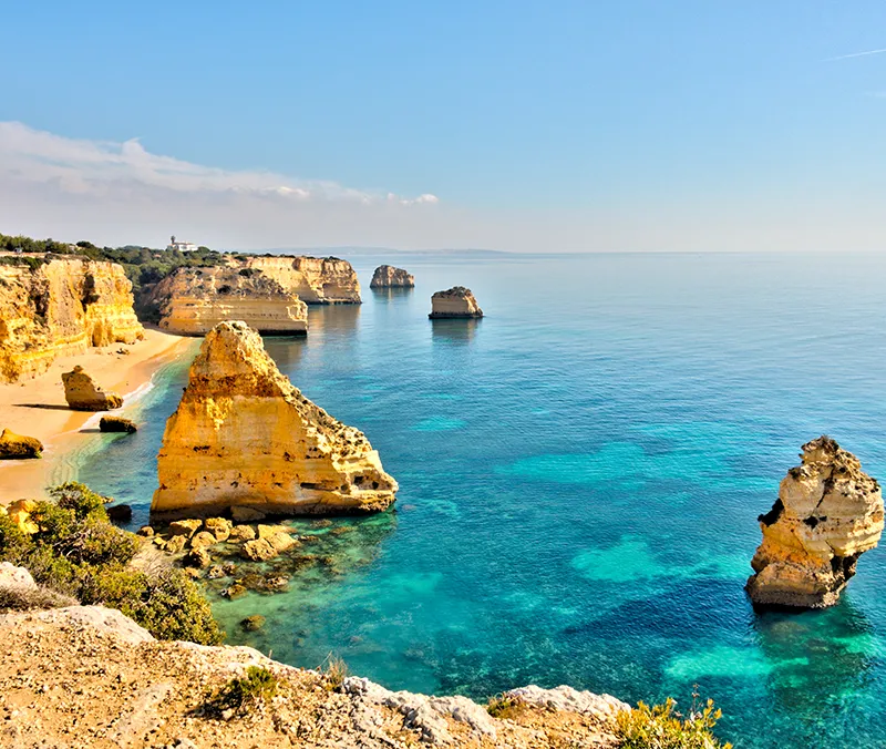 Coastal cliffs and turquoise sea in the Algarve, Portugal